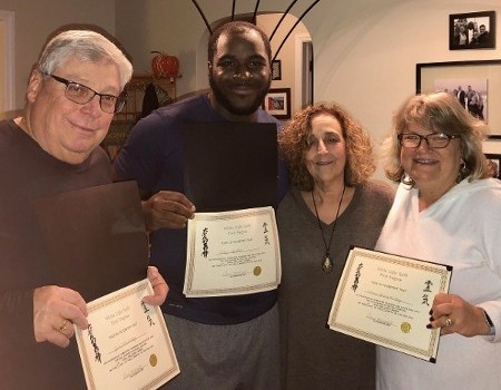 Group of people certified in Reiki holistic healing in Ocean Township, NJ.